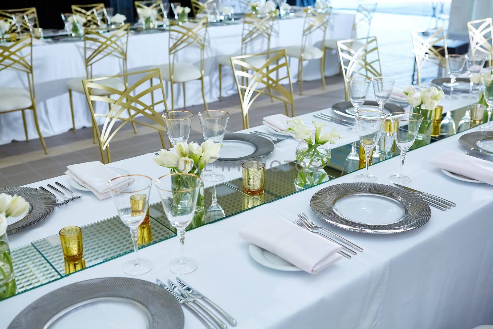 Beautifully organized event. Served festive table ready for guests. Shallow doff