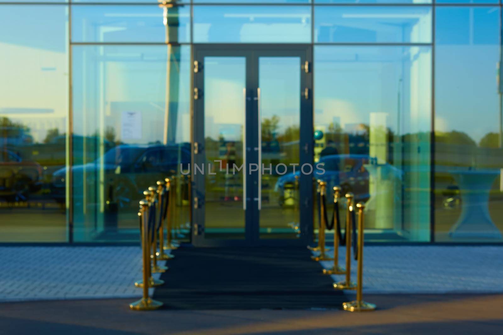 Black carpet between rope barriers. Blur background.