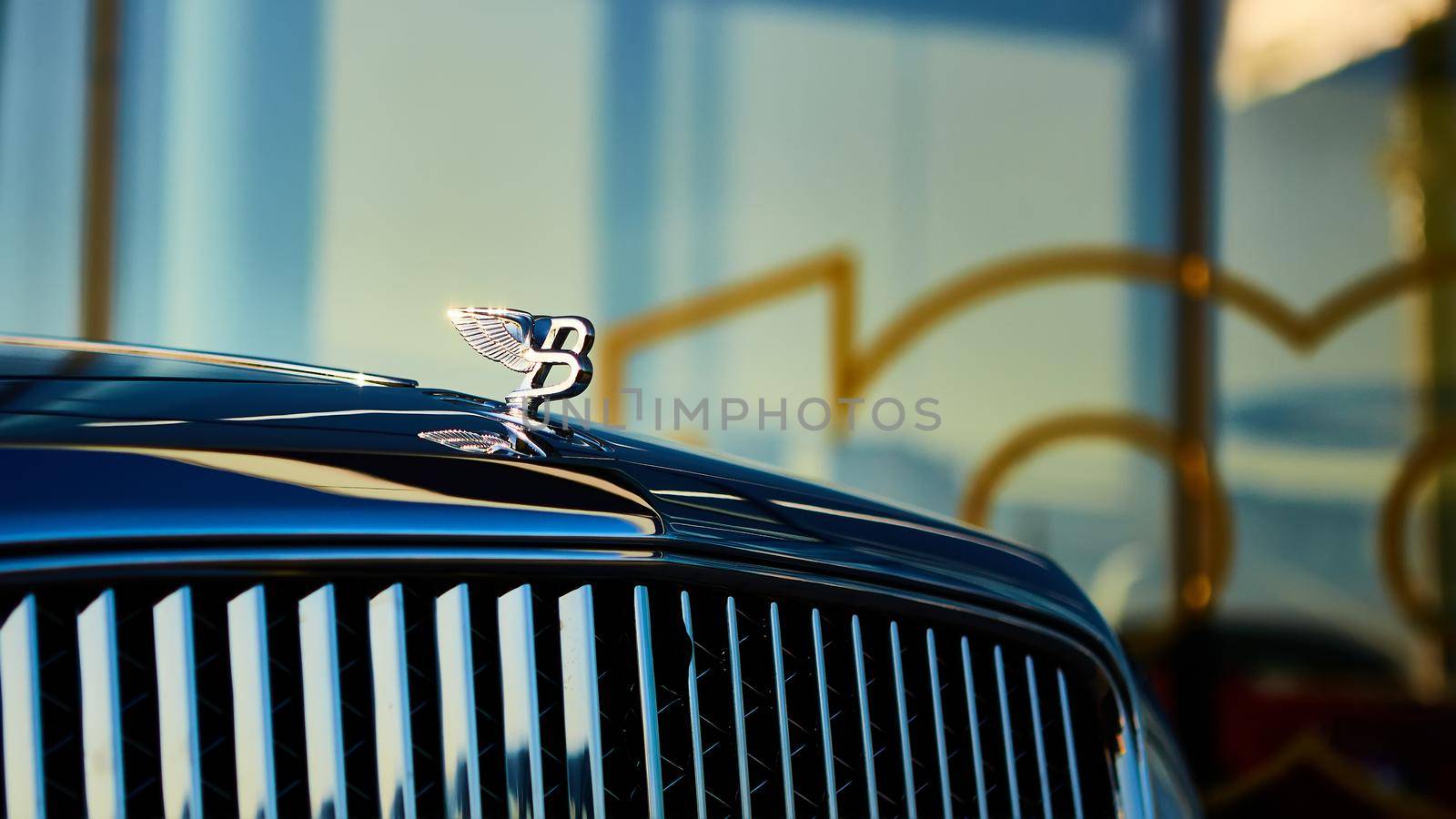 Kyiv, Ukraine - October 02, 2019: Bentley logo on the hood of Mulsanne. Mulsanne - launched in 2010 - is the only model of Bentley, carrying the Flying B distinctive hood ornament