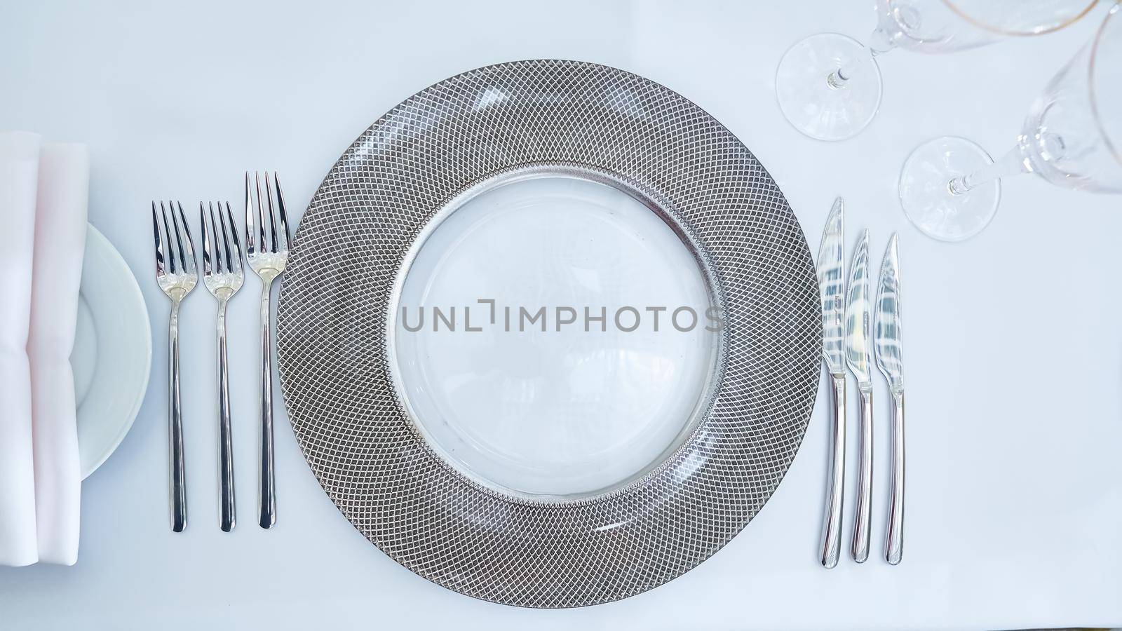 Beautifully organized event. Served festive table ready for guests. Shallow doff