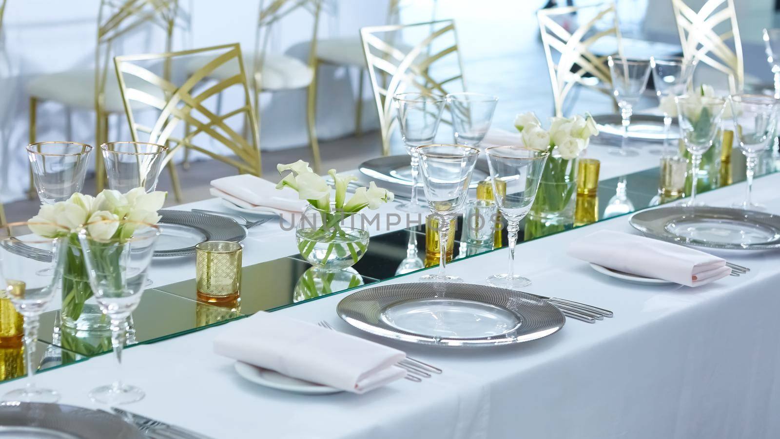 Beautifully organized event. Served festive table ready for guests. Shallow doff