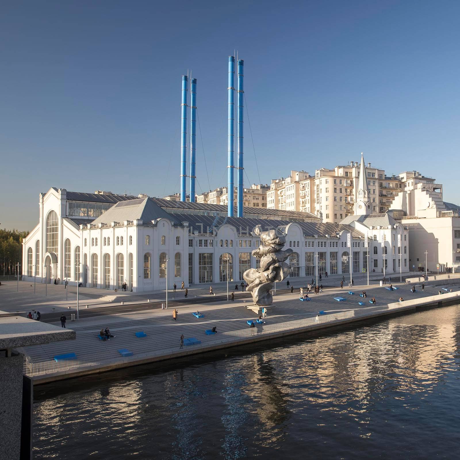 Moscow, Russia - September 4, 2021. Urs Fischer's sculpture Big Clay 4 on the Bolotnaya Embankment of Moscow river in front of the building of GES-2 , a cultural venue and former power plant