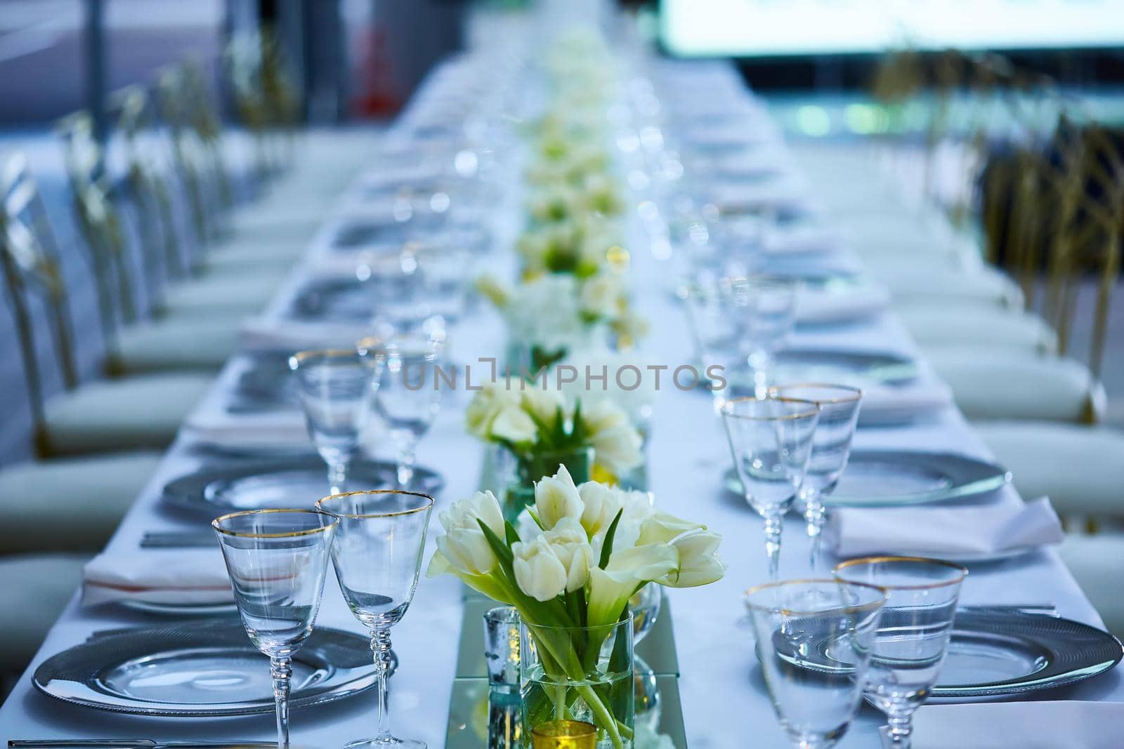 Elegance table set up with lotus flowers, selective focus