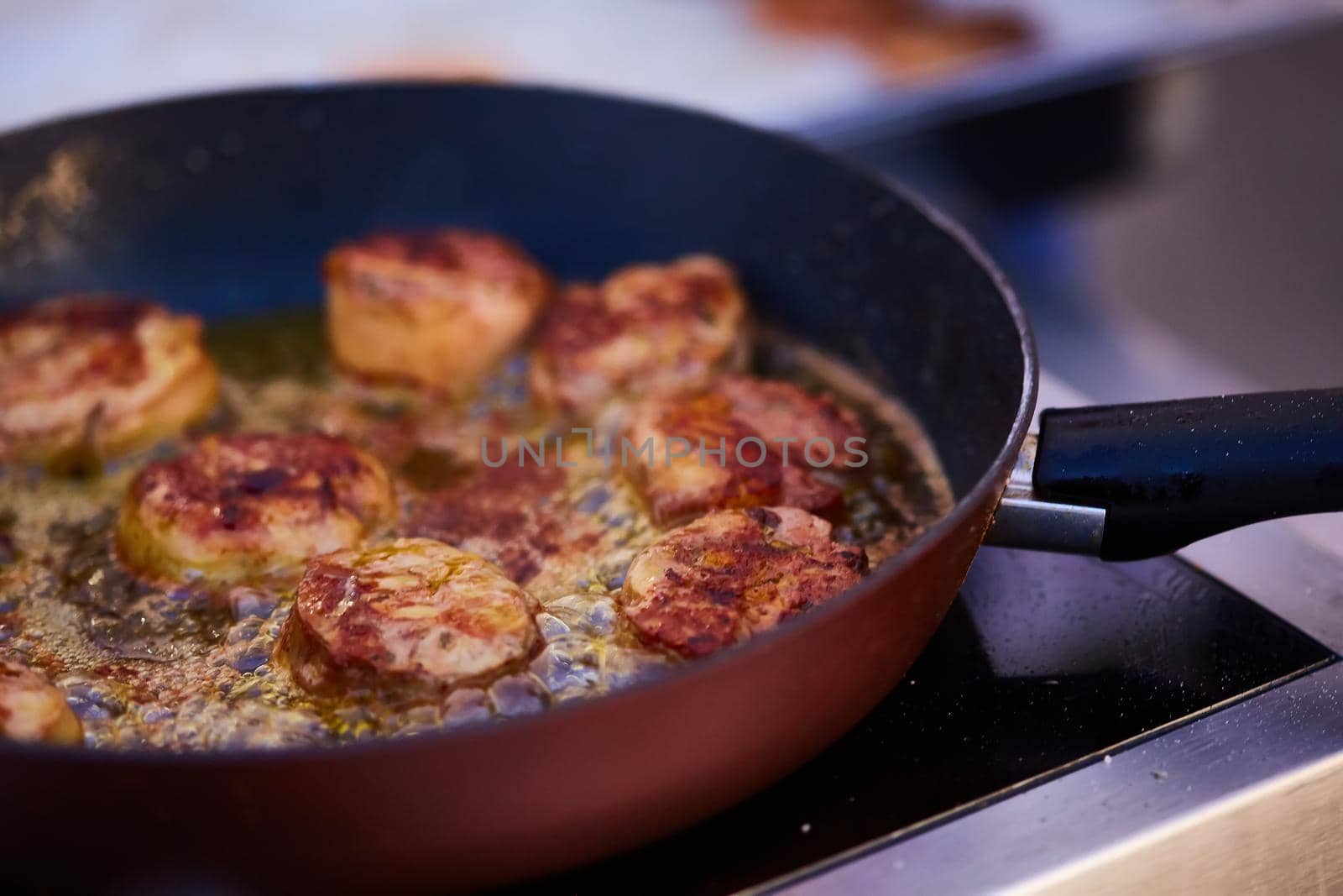 The beef steak in a frying pan. Shallow dof