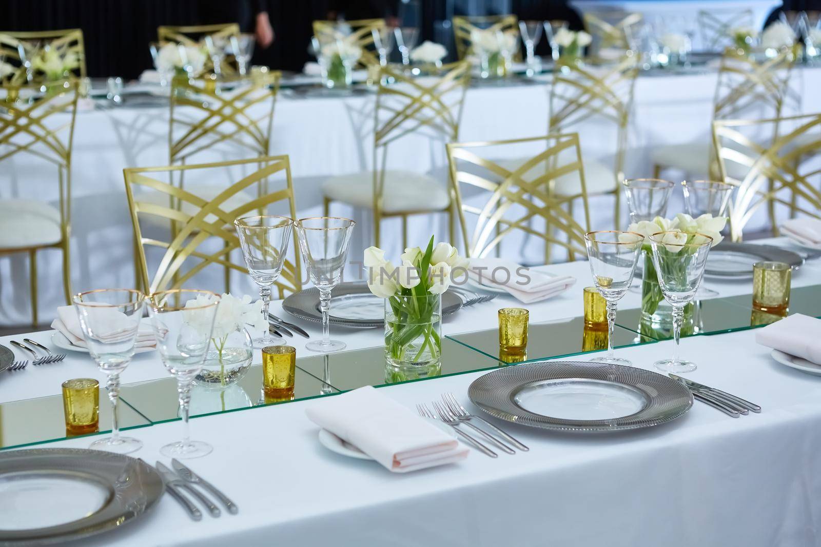 Beautifully organized event. Served festive table ready for guests. Shallow doff