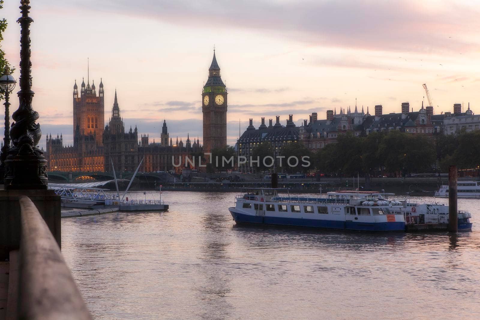 LONDON, UK - September 22, 2021 Big Ben and river at sunset in backlight