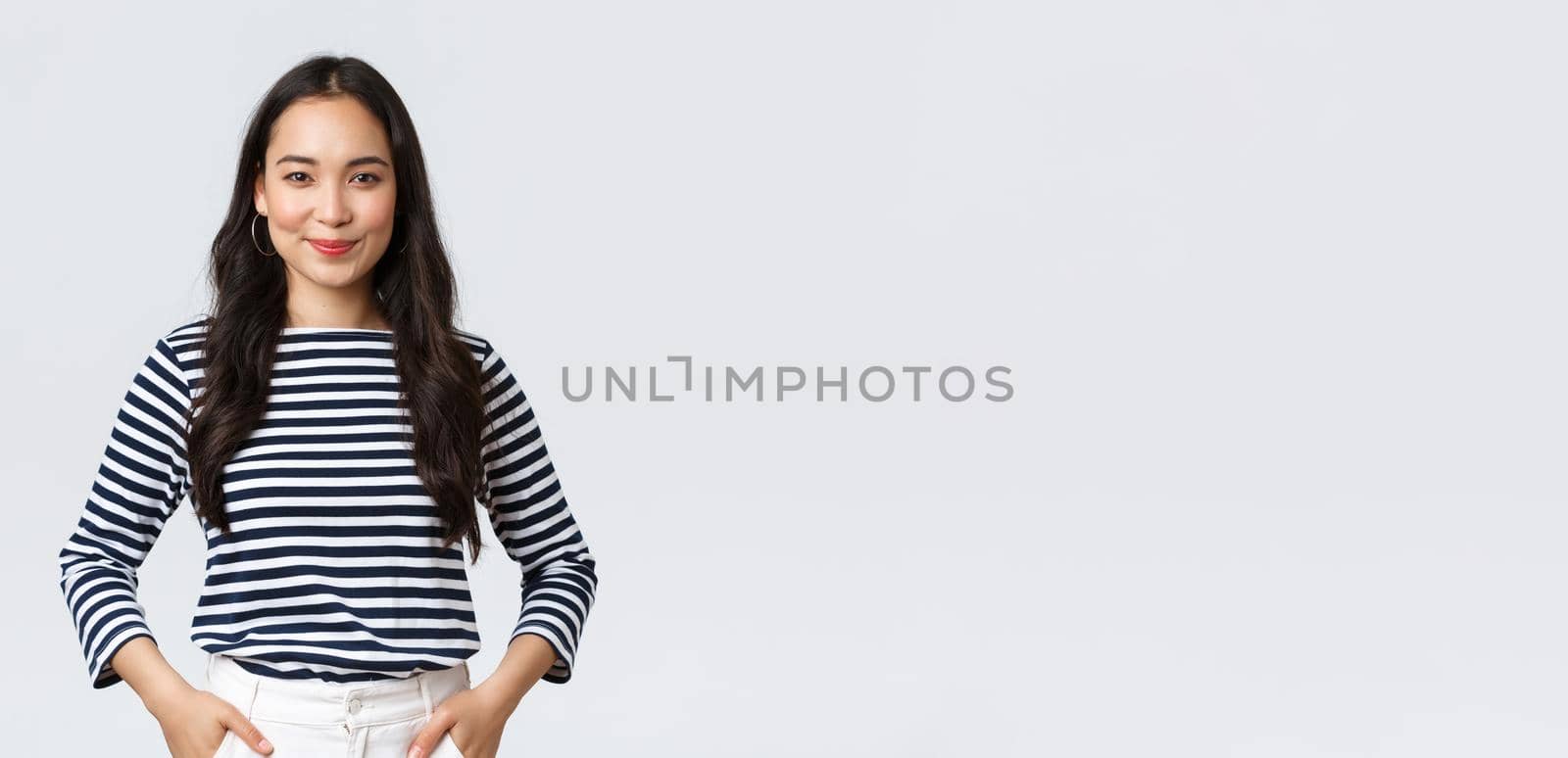Lifestyle, beauty and fashion, people emotions concept. Confident friendly-looking smiling young woman ready climb to top, fighting for new job position, standing determined.
