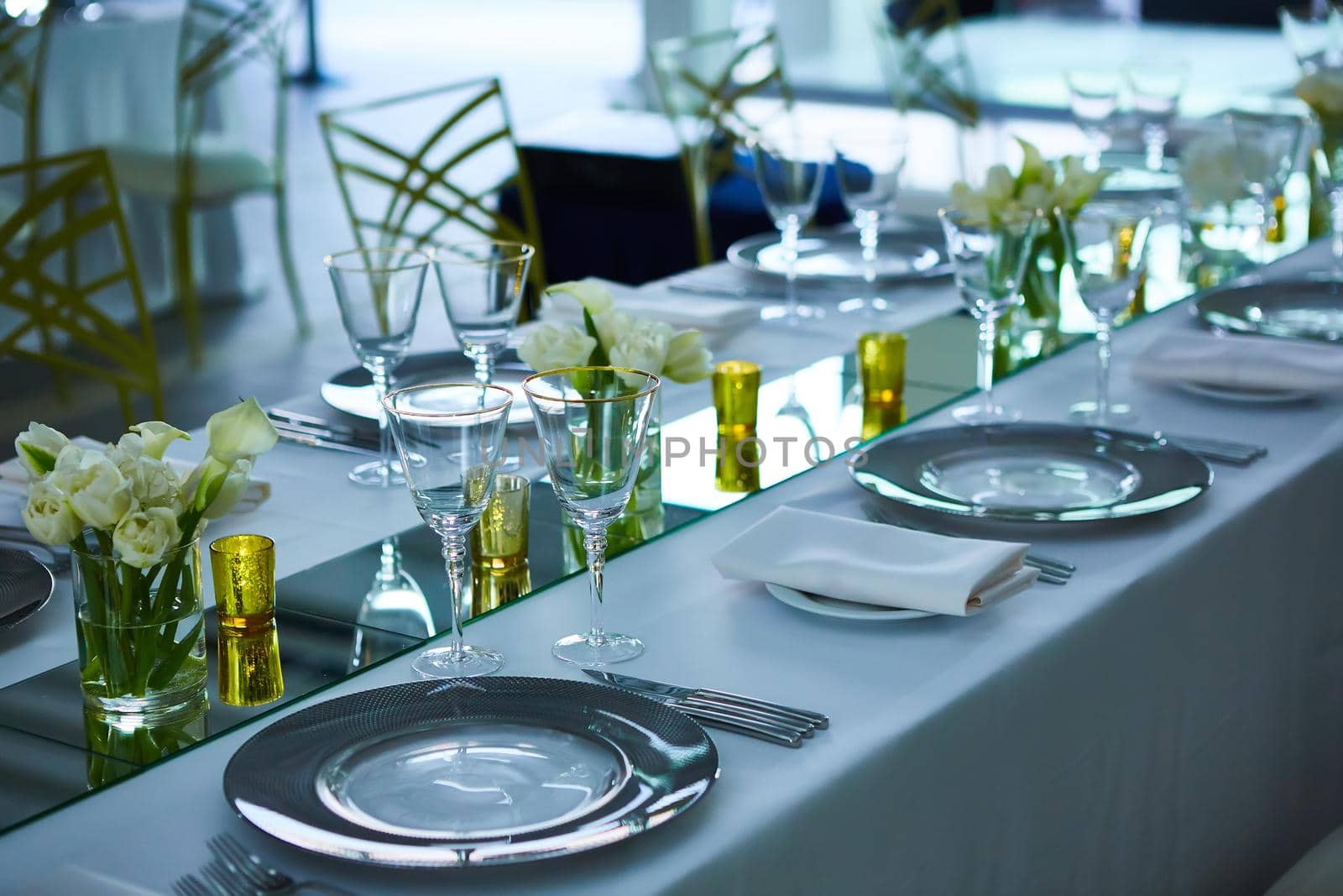 Elegance table set up with lotus flowers, selective focus