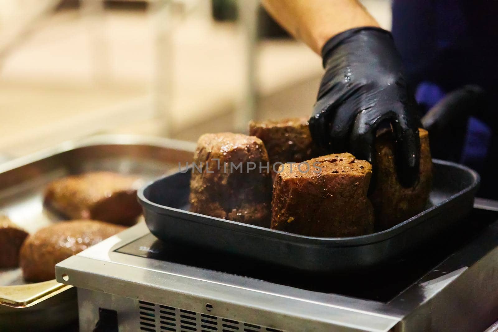 The beef steak in a frying pan. Shallow dof.