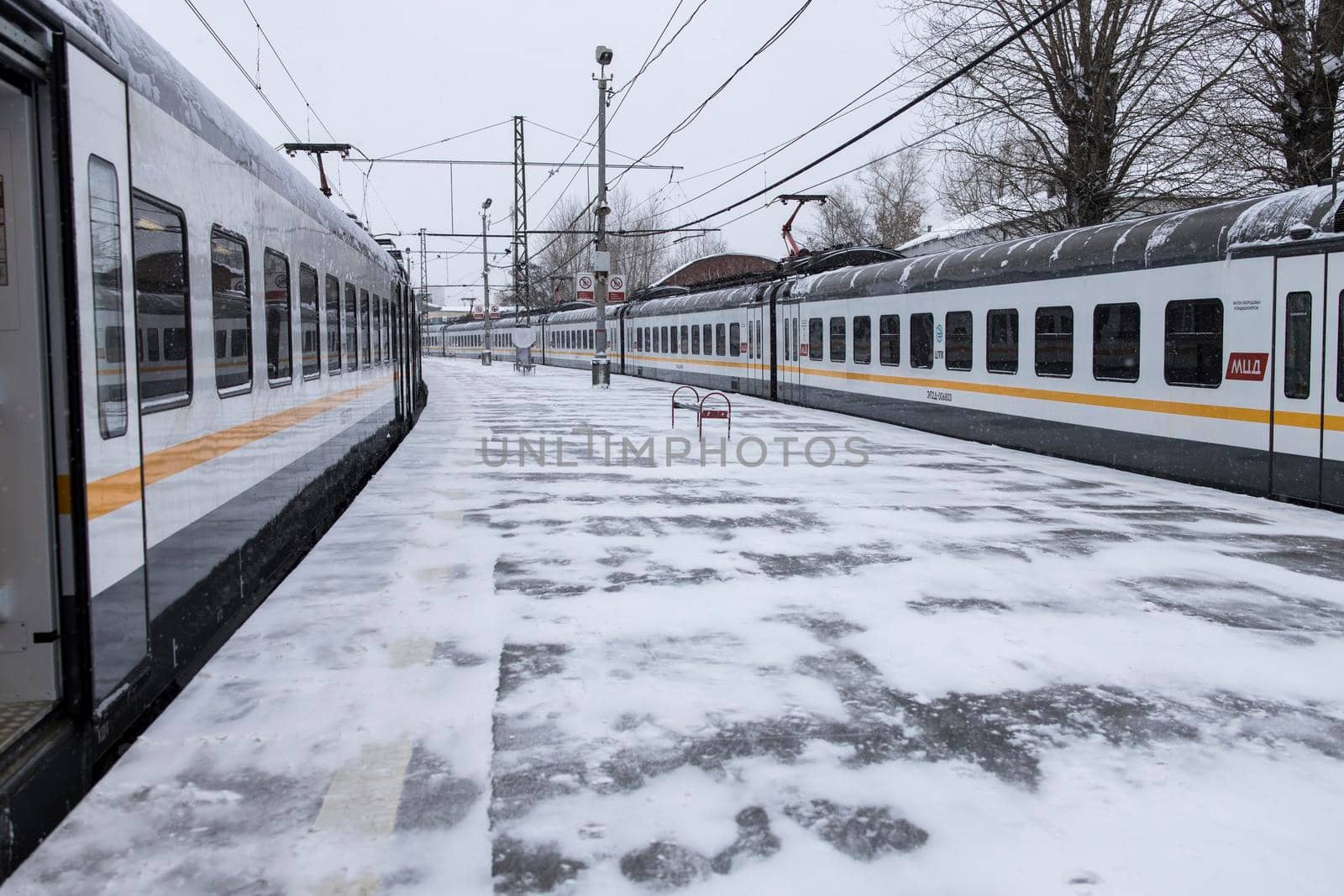 Moscow, Russia - 15 January, 2022, Suburban trains at the Rizhsky railway station are waiting for departure by elenarostunova