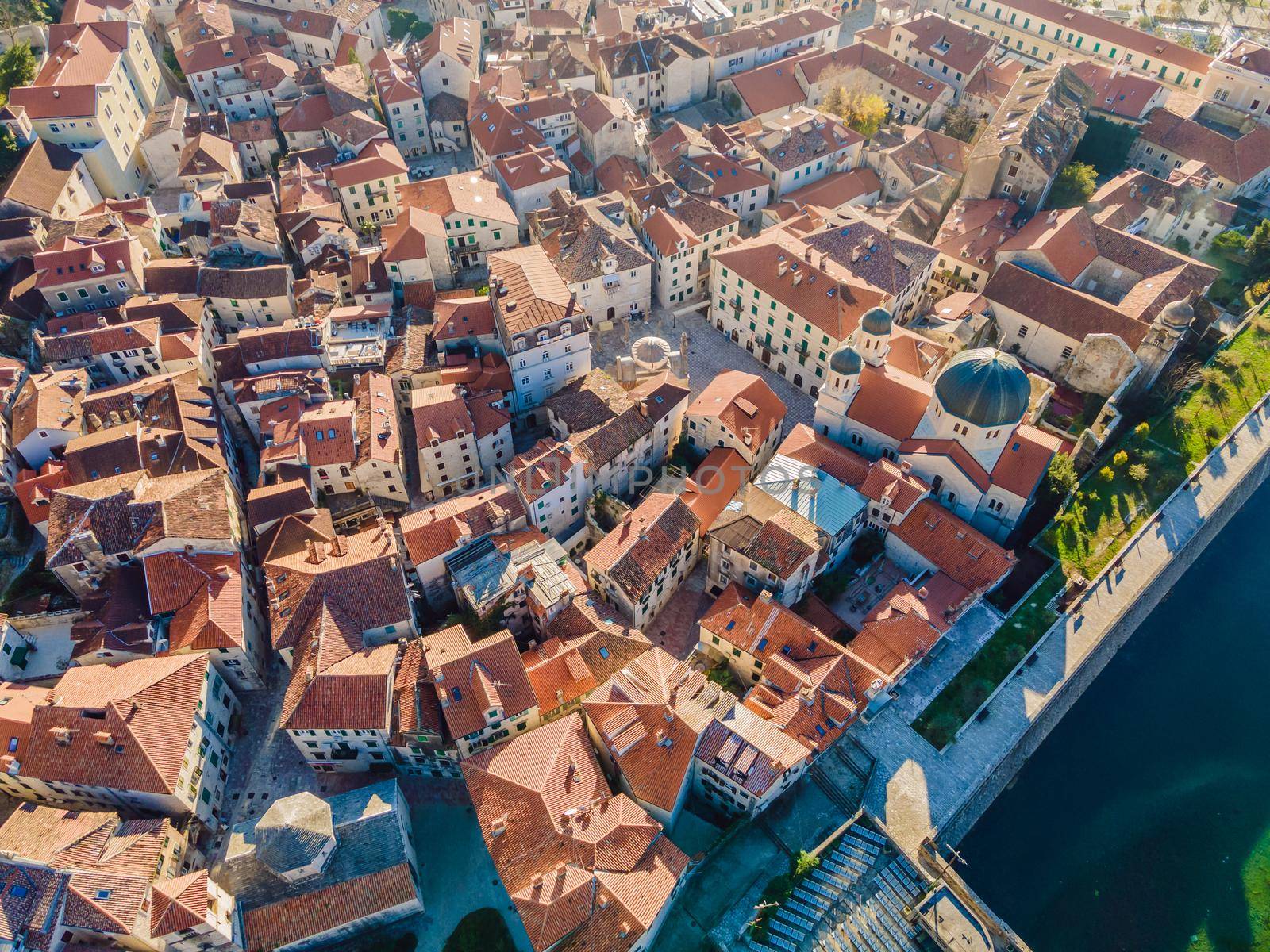 Old city. Kotor. Montenegro. Narrow streets and old houses of Kotor at sunset. View of Kotor from the city wall. View from above.