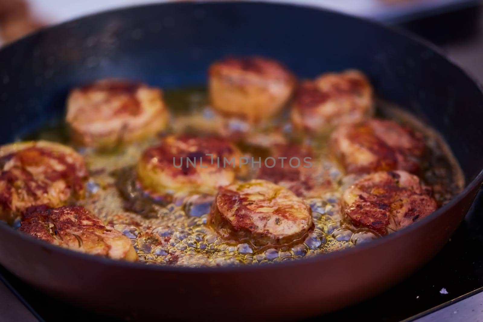 The beef steak in a frying pan. Shallow dof