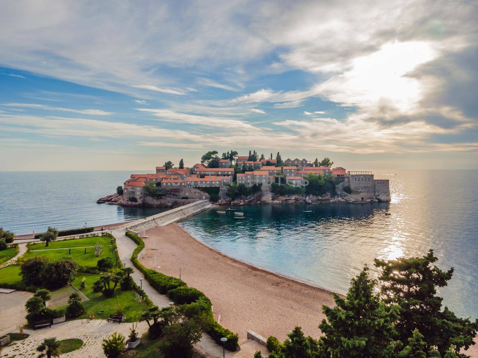 Aerophotography. View from flying drone. Panoramic view of Sveti Stefan island in Budva in a beautiful summer day, Montenegro. Top View. Beautiful destinations by galitskaya