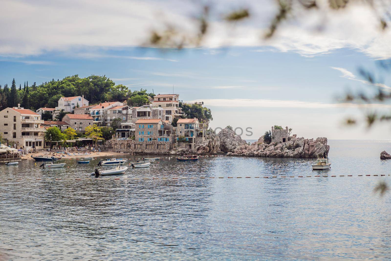 Picturesque summer view of Adriatic sea coast in Budva Riviera near Przno village. Cozy beach and buildings on the rock. Location: Przno village, Montenegro, Balkans, Europe by galitskaya