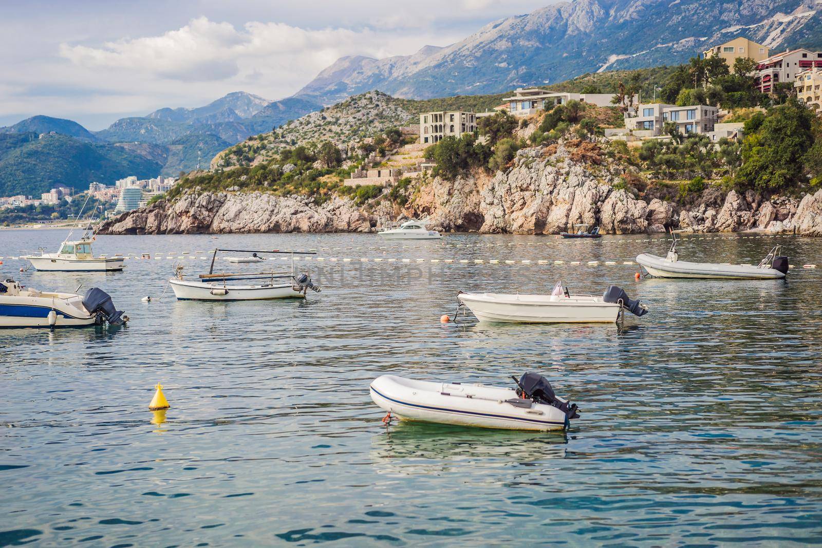 Picturesque summer view of Adriatic sea coast in Budva Riviera near Przno village. Cozy beach and buildings on the rock. Location: Przno village, Montenegro, Balkans, Europe.