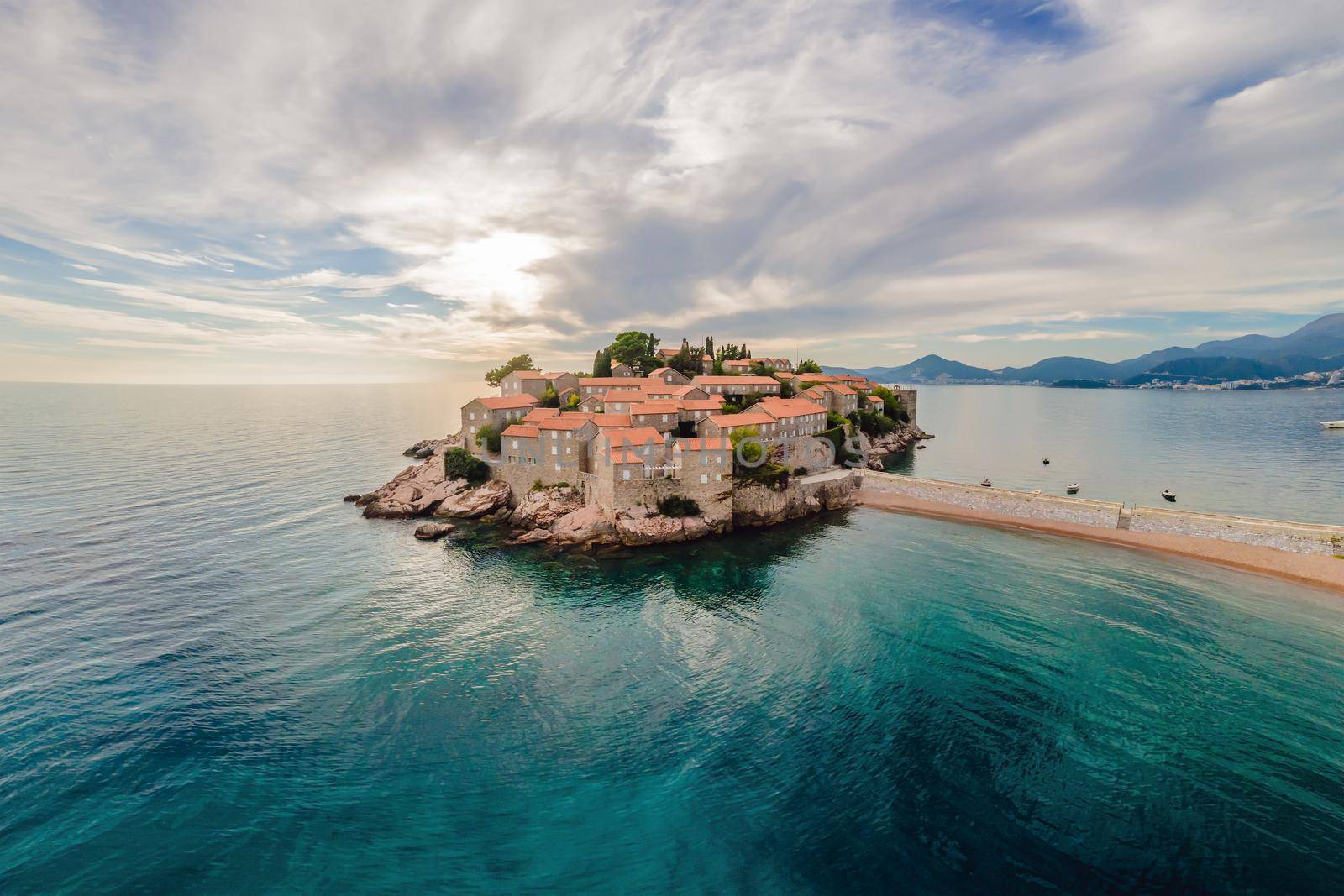 Aerophotography. View from flying drone. Panoramic view of Sveti Stefan island in Budva in a beautiful summer day, Montenegro. Top View. Beautiful destinations by galitskaya