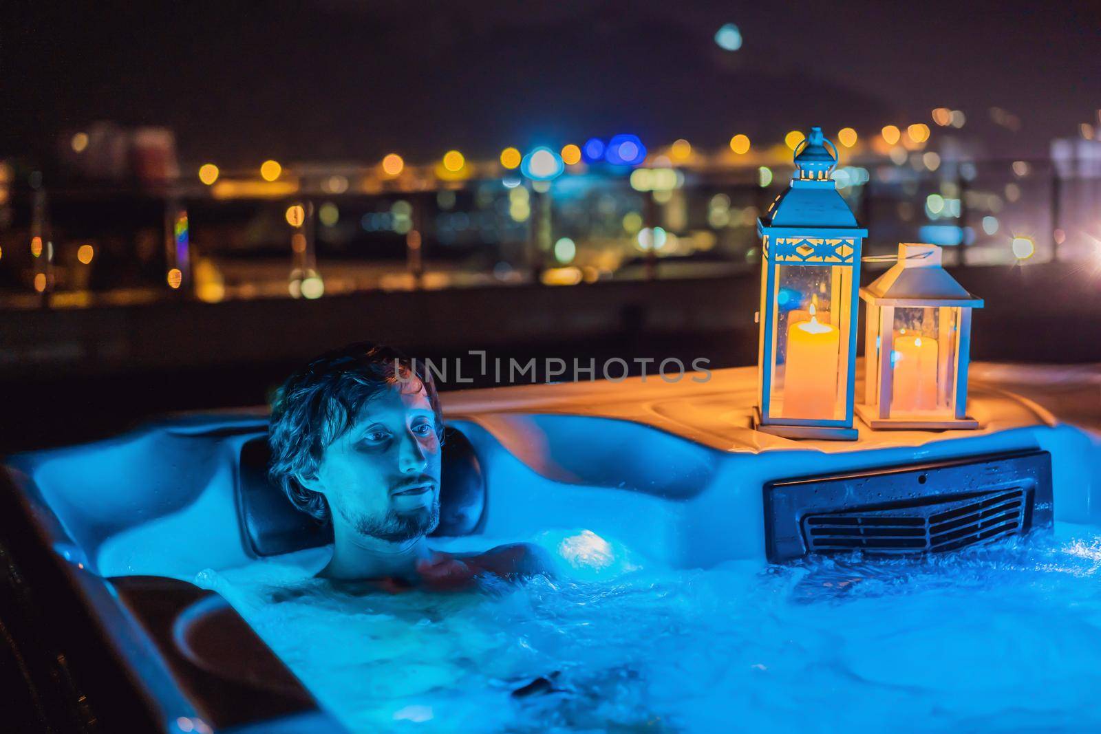 Portrait embarrassed man relaxing at hot tub to whom the woman did not come on a date. February 14 concept. St. Valentine's Day by galitskaya