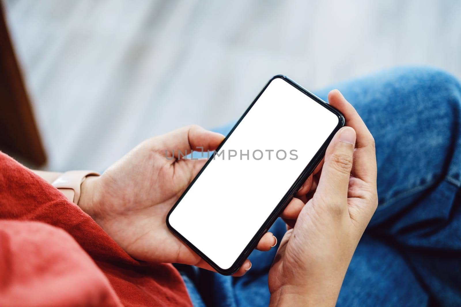 Editing, Advertising Media, Creative Work, Close up woman hand holding white phone on blank screen clipping path. by Manastrong