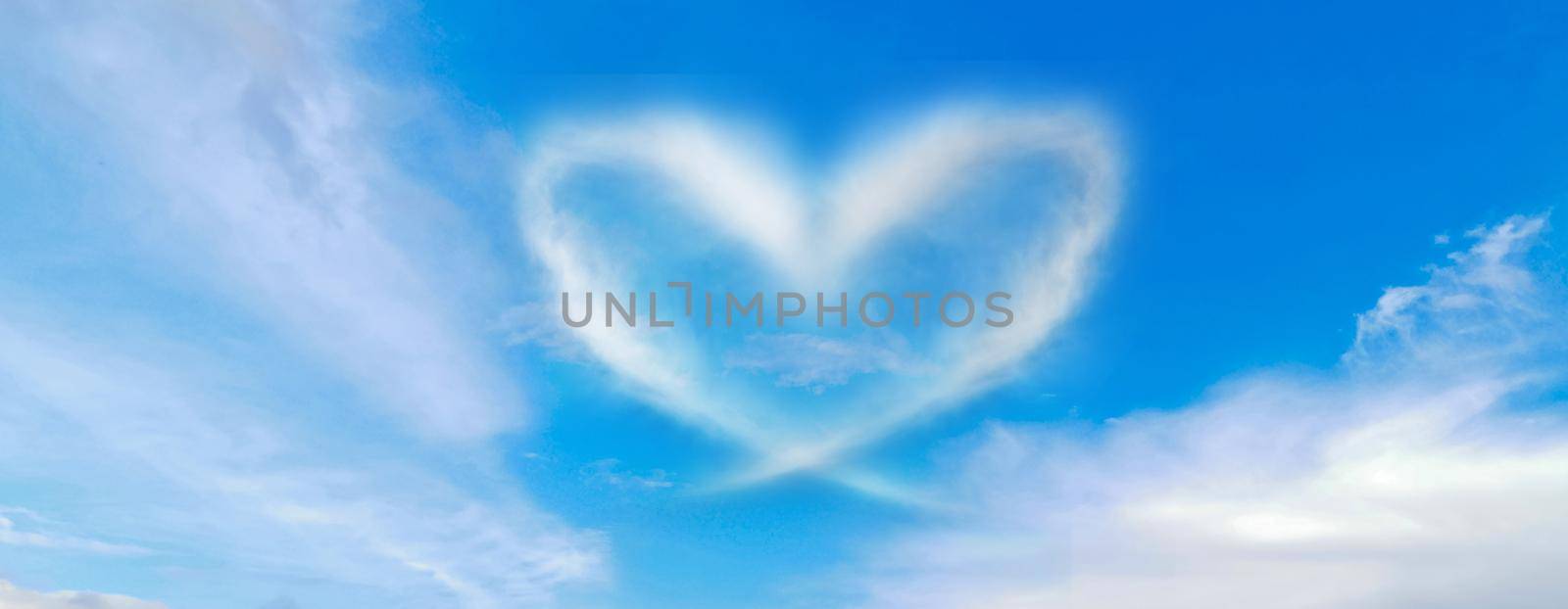 blue sky with hearts shape clouds. Beauty natural background.