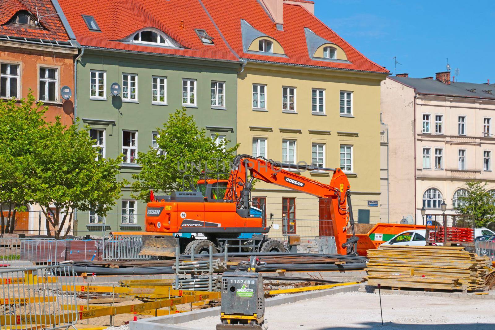 Poznan, Poland, August 15, 2020: construction machinery on the city street. Road repair. by kip02kas