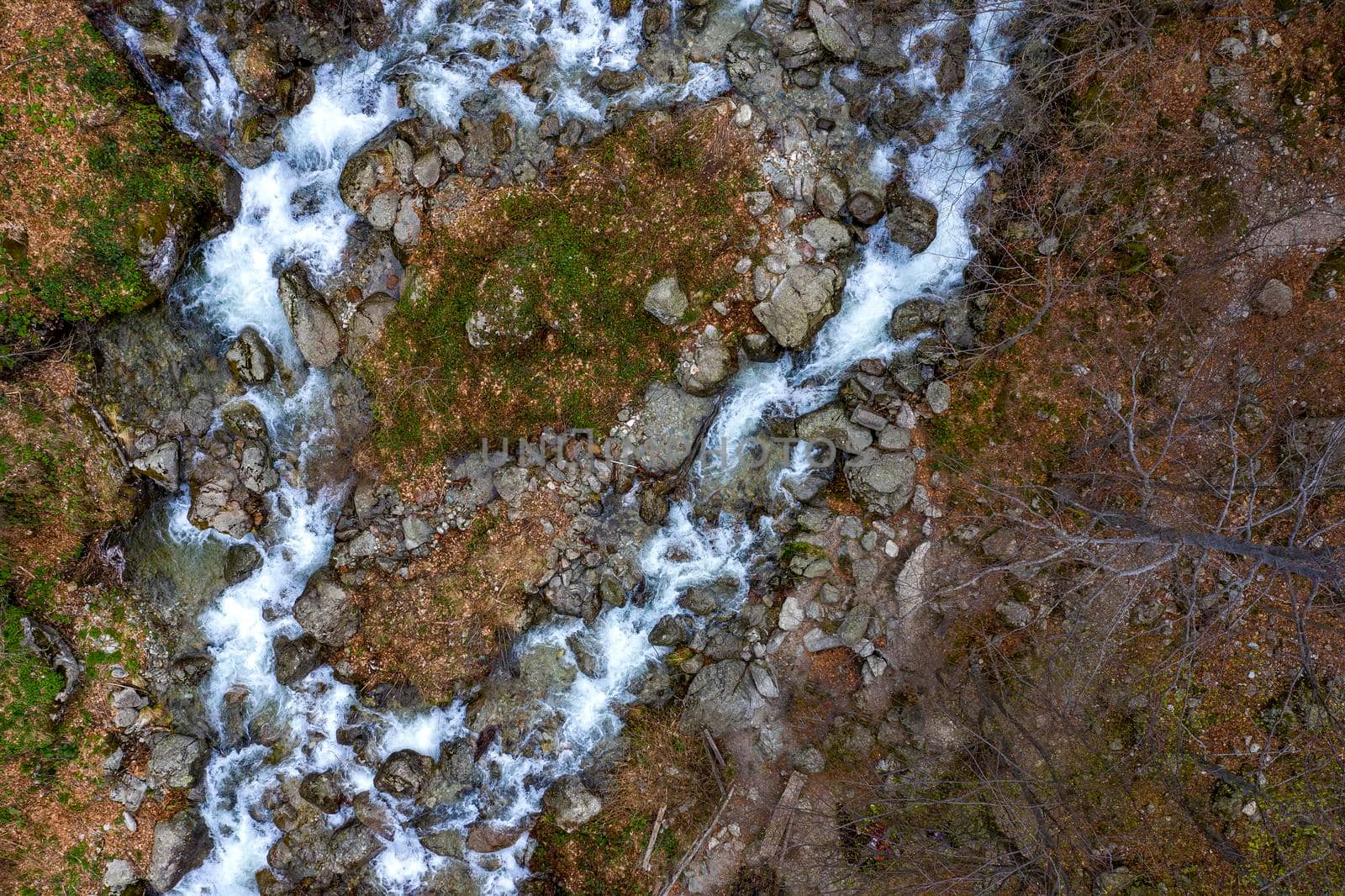 Top view from drone of two rapids of mountain river with stones. nature background