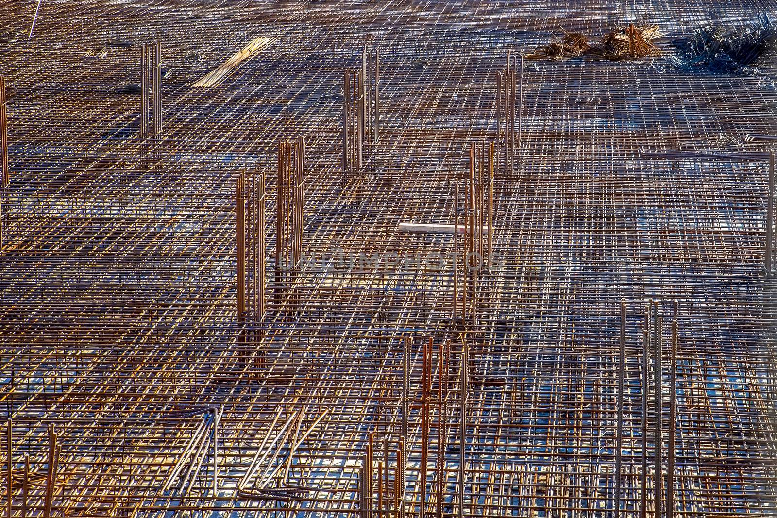 Billets of reinforcement at the construction site. New construction. Reinforced concrete construction.