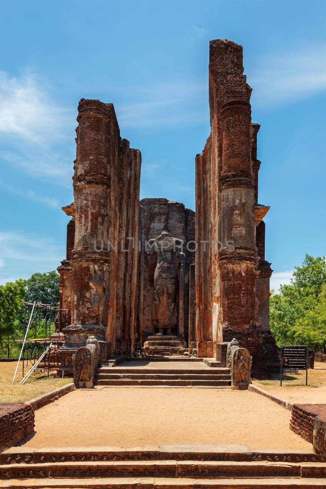 Ruins of Lankatilaka Vihara - temple with Buddha image. Ancient city of Pollonaruwa - famous tourist attraction and archaelogical site, Sri Lanka