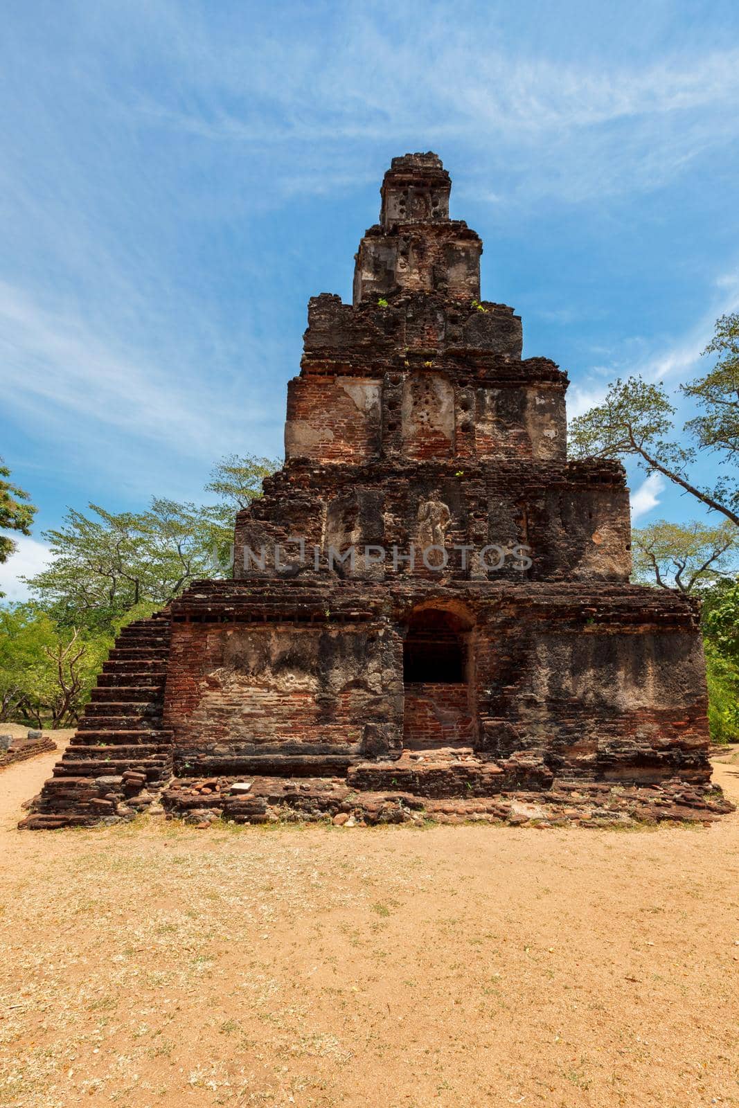 Satmahal Prasada tower 12th century step pyramid in Quadrangle, Polonnaruwa - famous tourist destination and archaelogical site, Sri Lanka