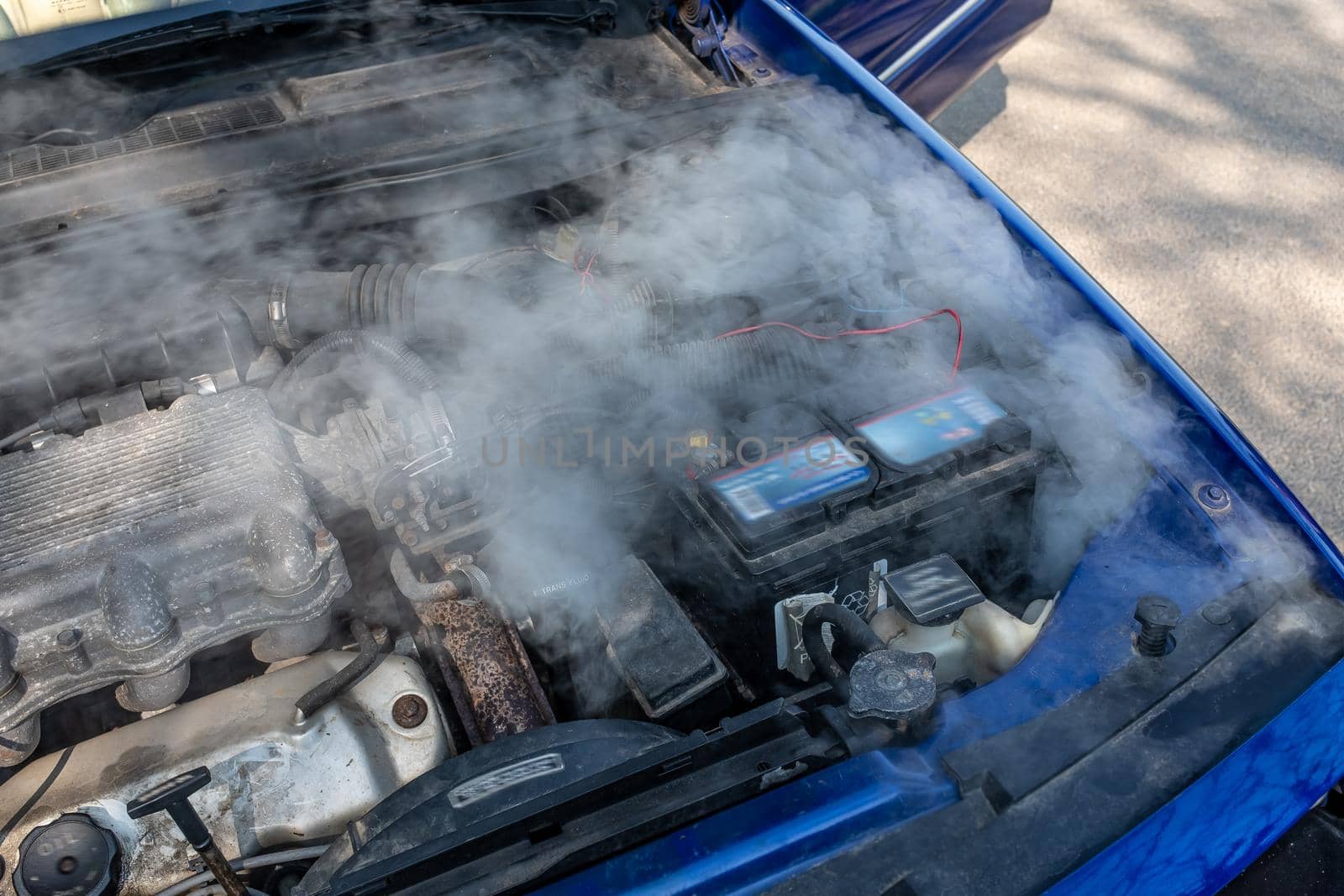 April-03-2022- Vintage car show-France-Bernay-Normandie Overheating of the engine on a car Problems with hoses. by JPC-PROD