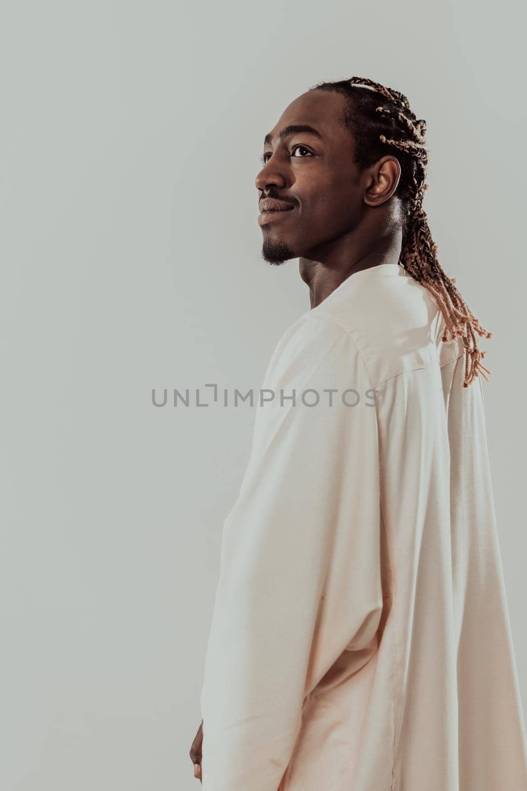 Portrait of handsome african black man in traditional islamin sudan fashion clothes. Selective focus . High quality photo