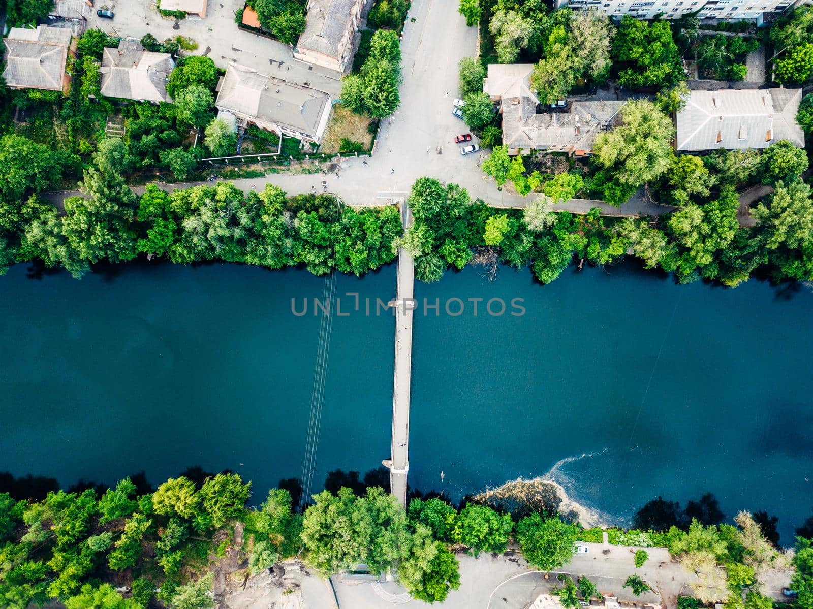 Aerial view of the old bridge over the river from the quadrocopter by mosfet_ua
