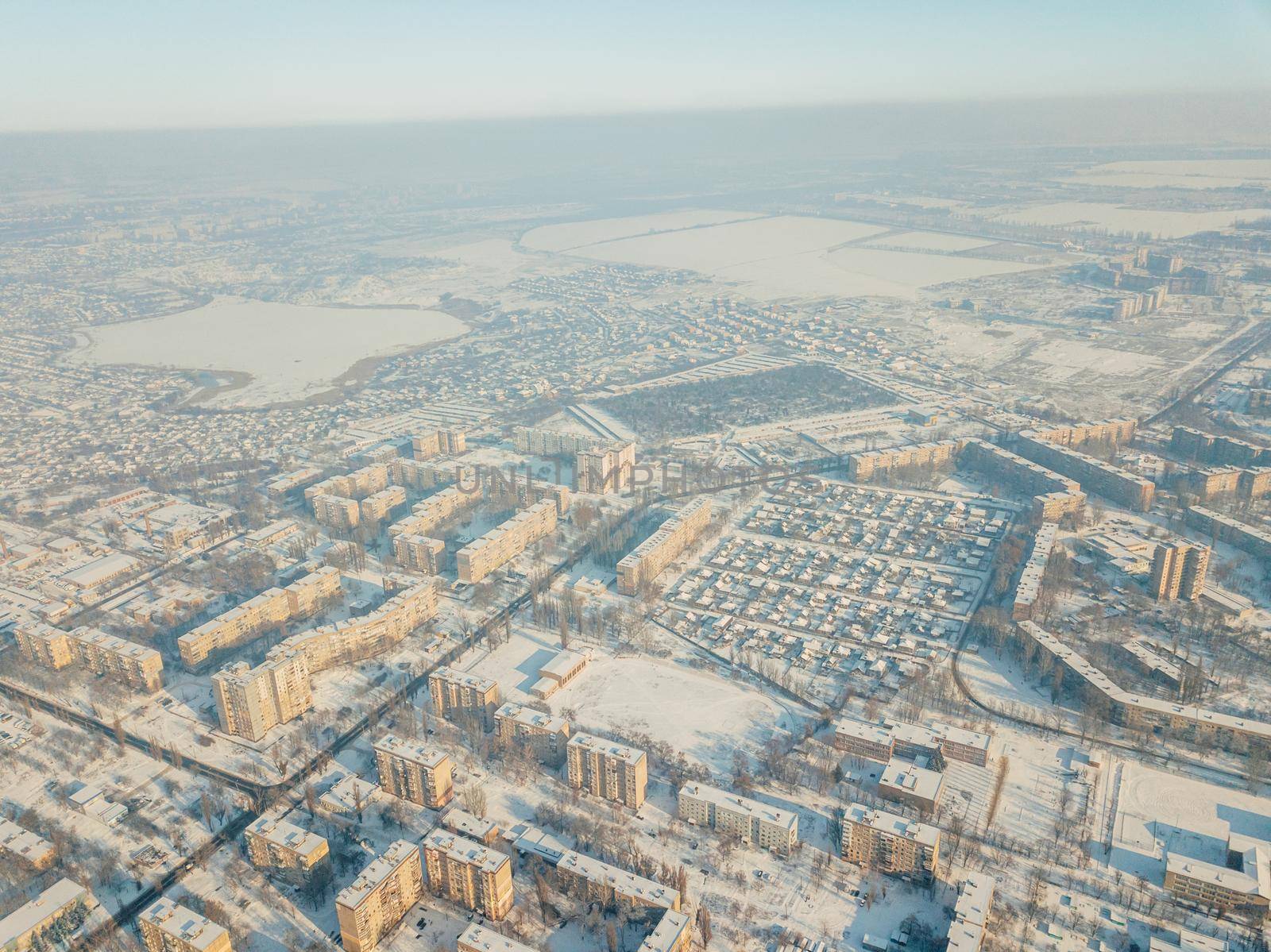 Aerial view of a freeway intersection Snow-covered in winter.,