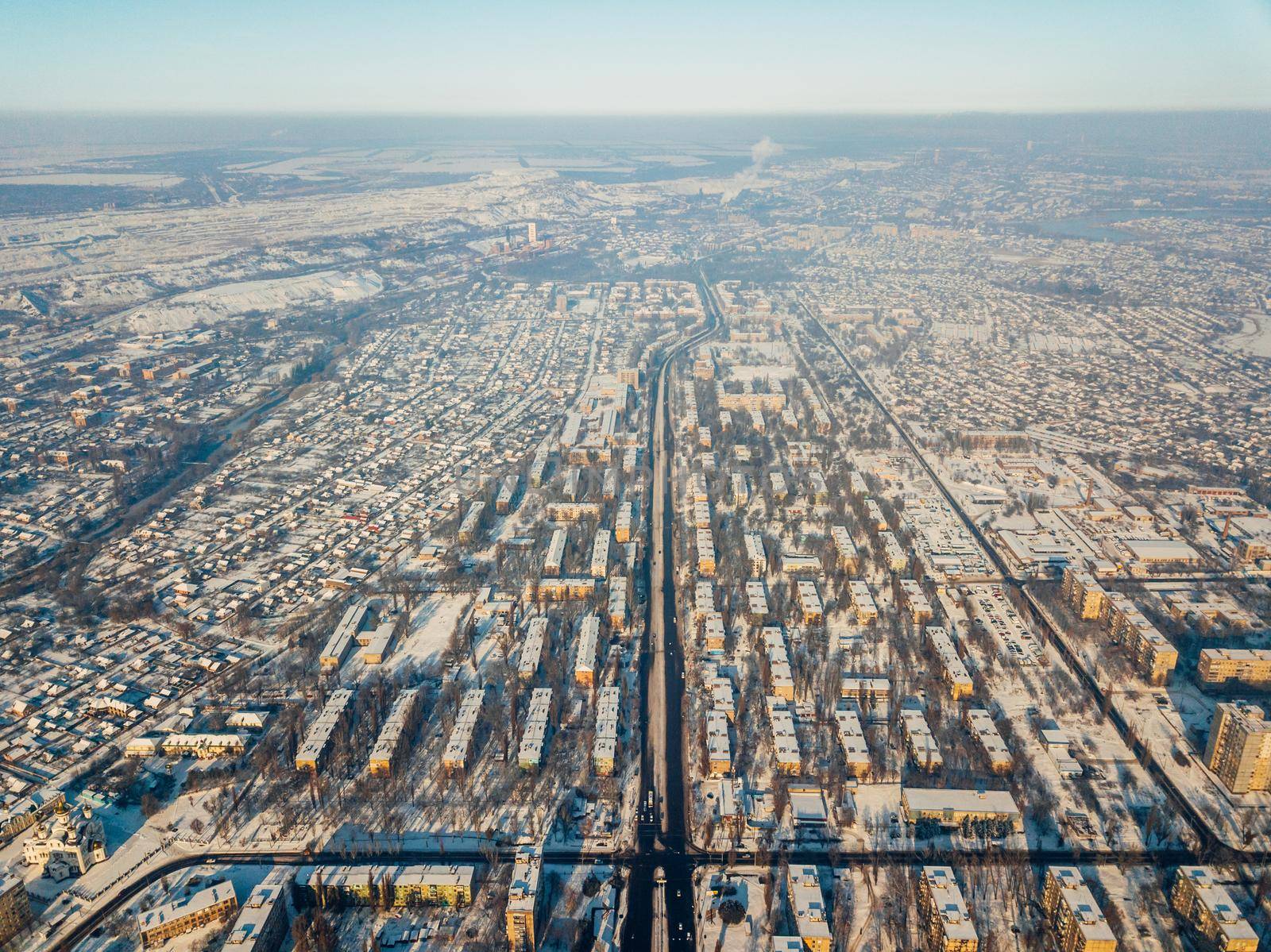 Aerial view of a freeway intersection Snow-covered in winter. by mosfet_ua