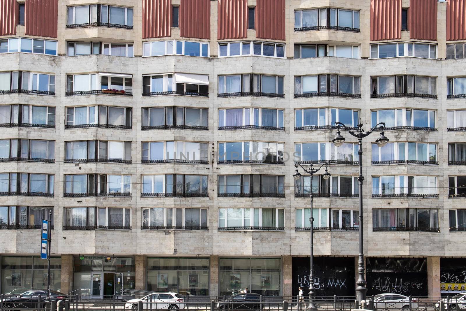 Saint Petersburg, Russia - August 17, 2021: Multi-storey block house built in the seventies. Facade