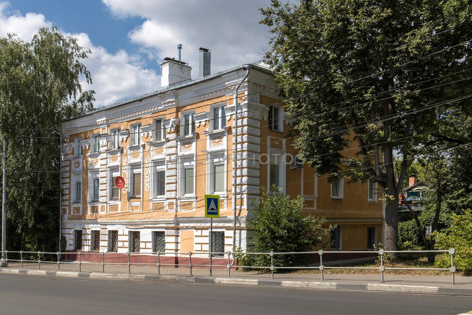 Serpukhov, Russia - June 18, 2021: A two-story merchant mansion painted yellow on Voroshilov Street