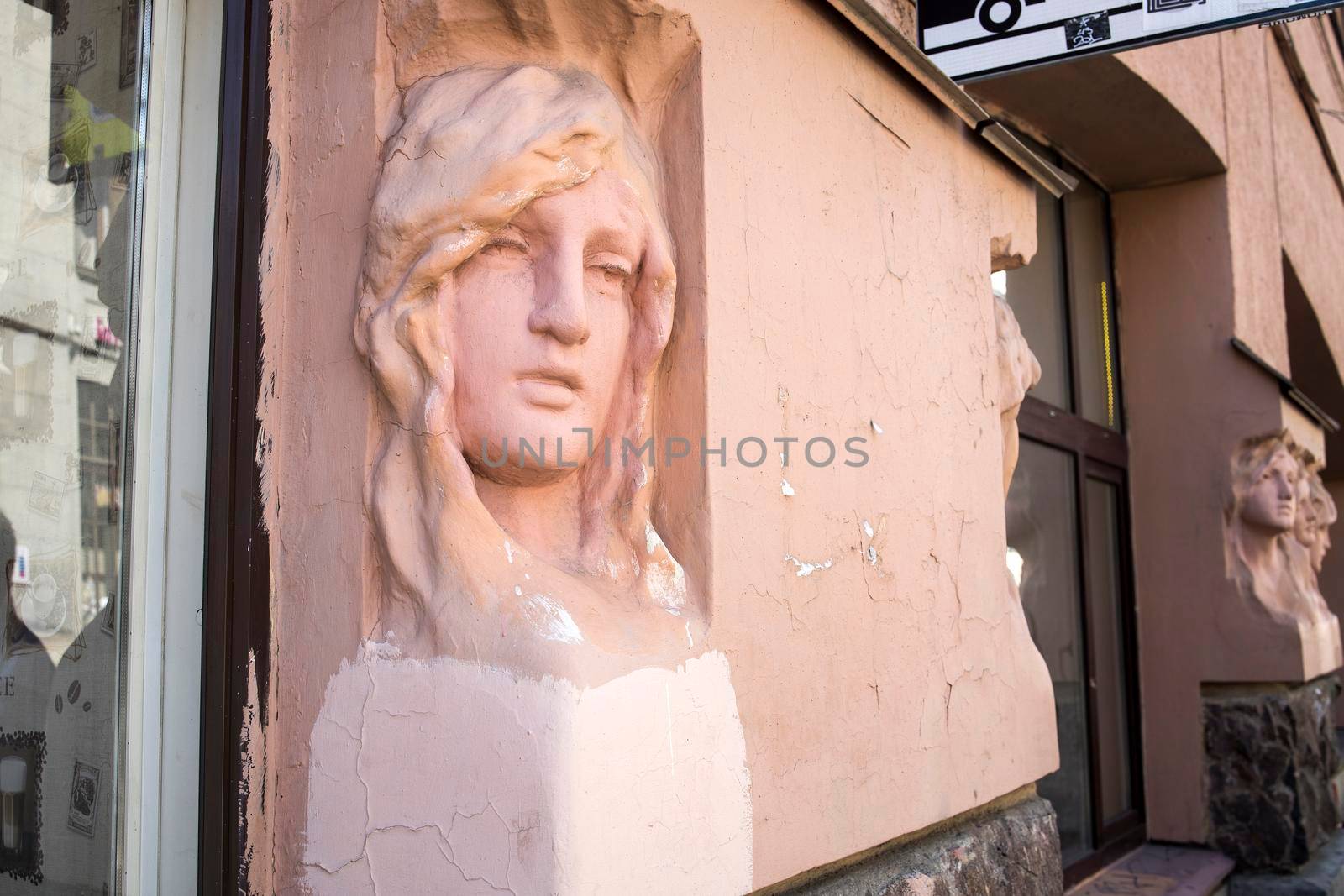 Saint Petersburg, Russia - 9 August 2021, House of Nikolaevs at 25 Sadovaya Street with bas-reliefs of women in the Art Nouveau style