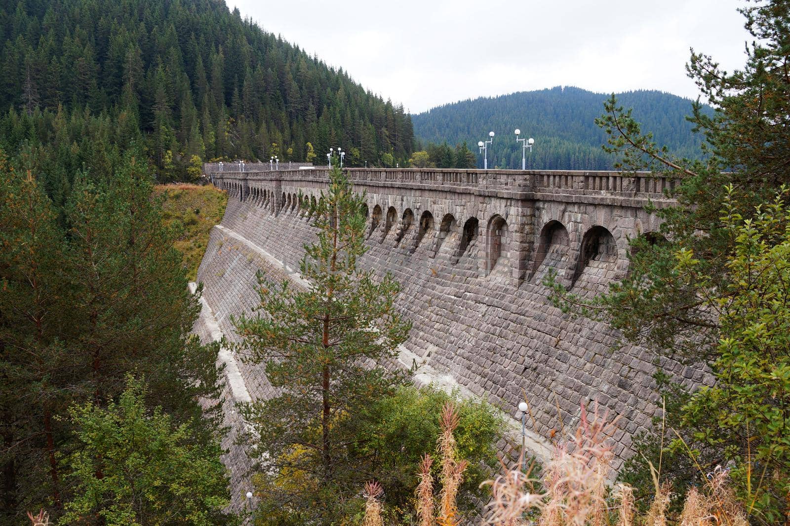 stone dam bridge on the mountain lake Big Beglik in Bulgaria by Annado