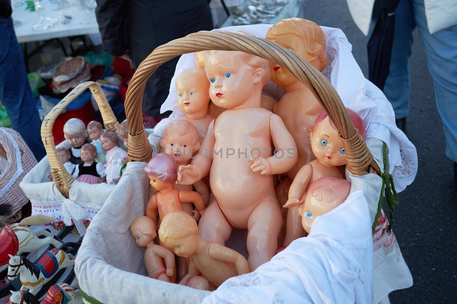 Moscow, Russia - 04 September 2021, Antique bobbleheads of various sizes in a basket from the Soviet Union era at a flea market at the weekend at the Museum of Moscow