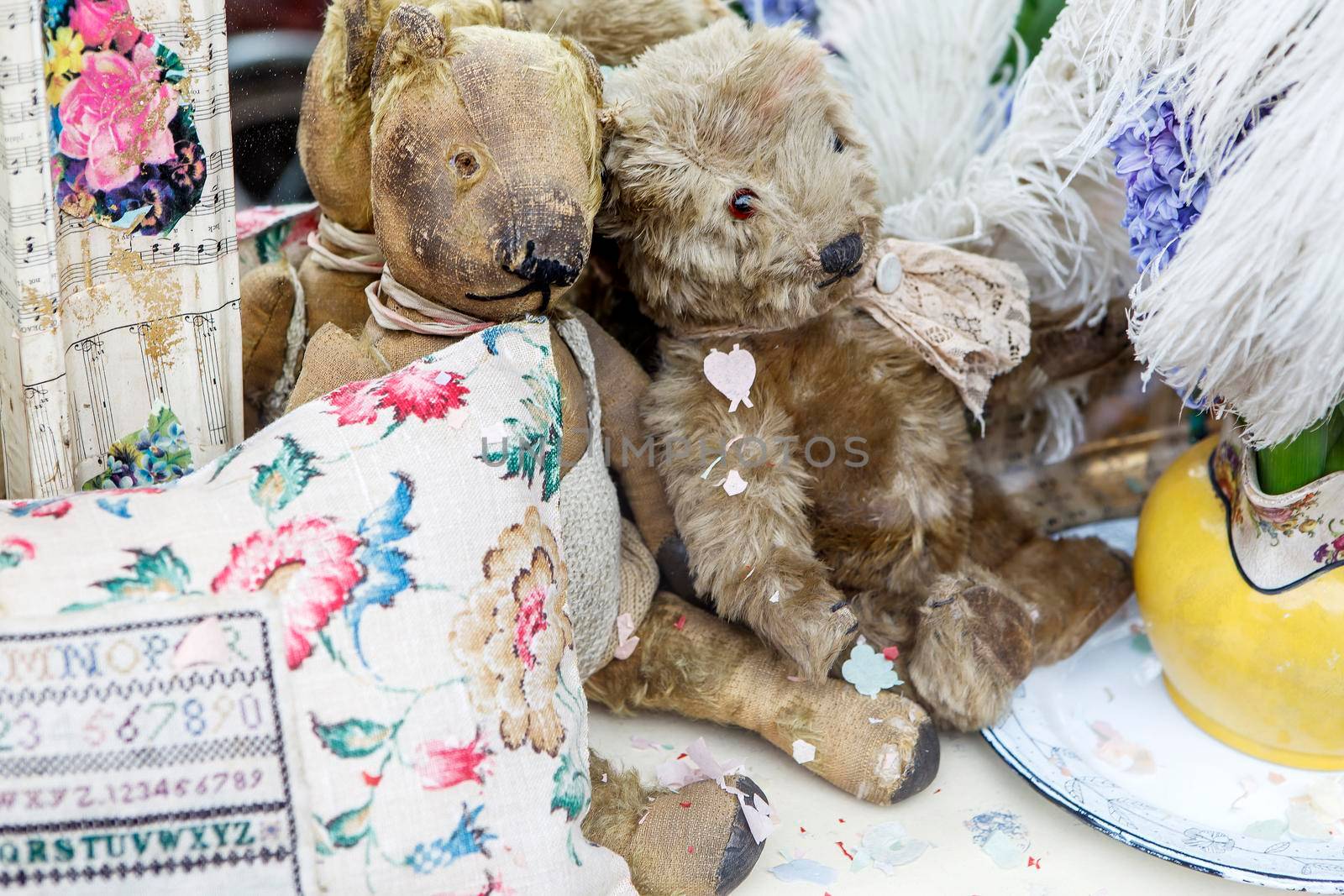 London, UK - 17 July 2019, Two old vintage teddy bear on the display on Spitalfields flea market