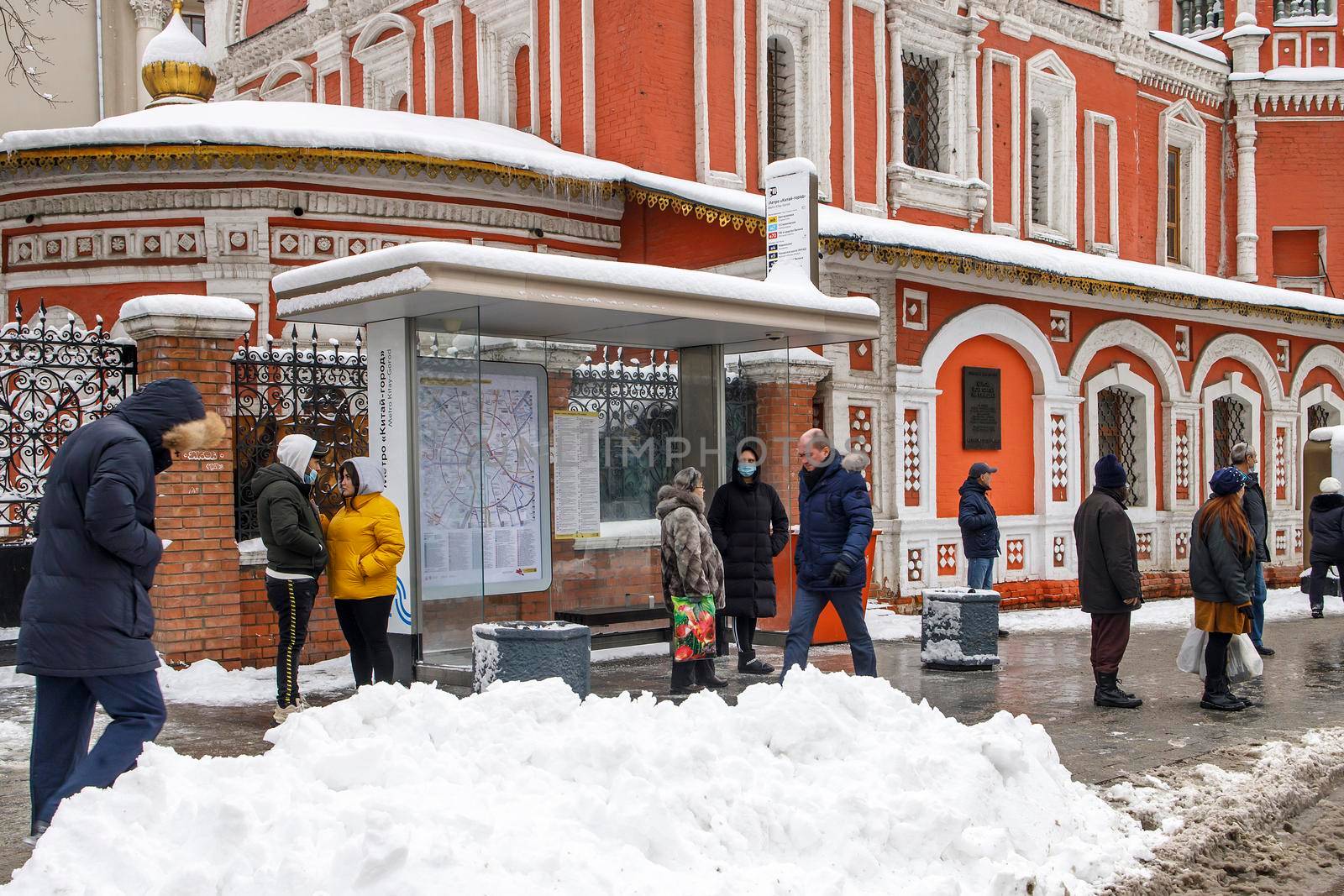 Moscow, Russia - 20 December 2021, Bus stop at Church of All Saints on Kulishki, Moscow, Slavyanskaya square, 2