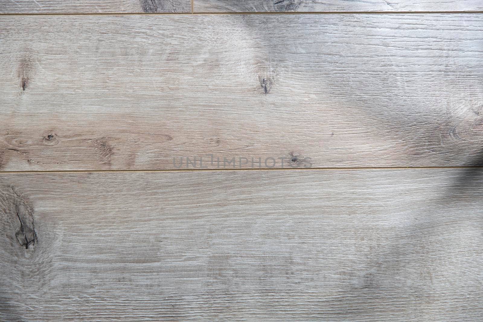 Texture of a beige laminate that looks like a wooden plank by elenarostunova