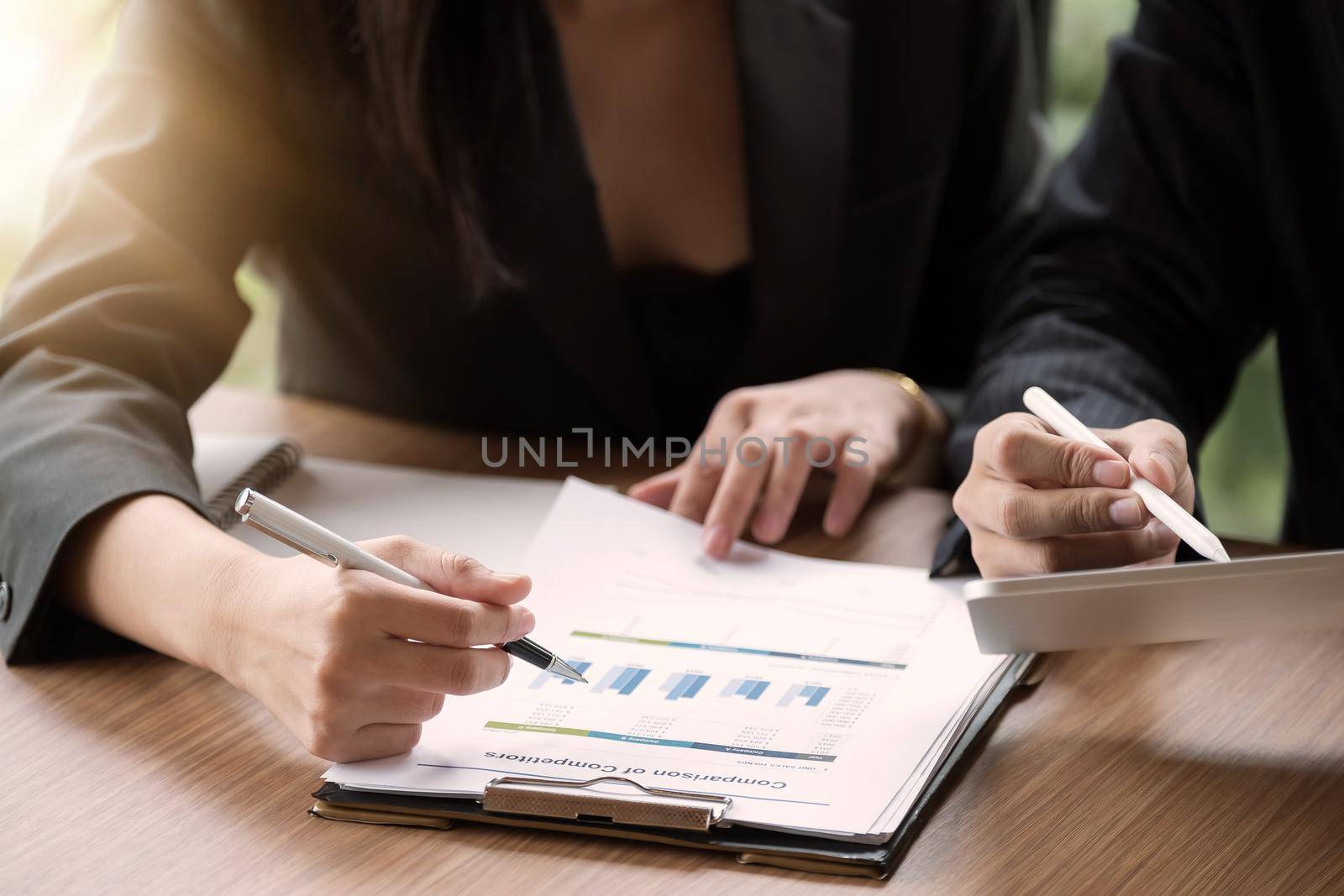 Close up Group of business people busy discussing financial matter during meeting. Corporate Organization Meeting Concept.