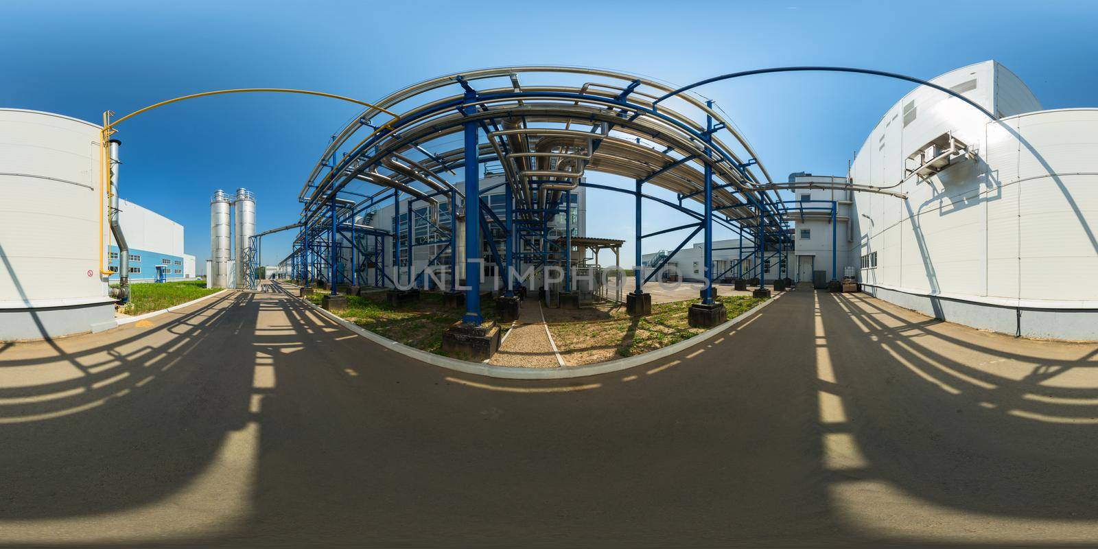 Spherical panorama of outdoor coolant pipeline infrastructure. Full spherical (360 by 180 degree) panorama in equirectangular projection.