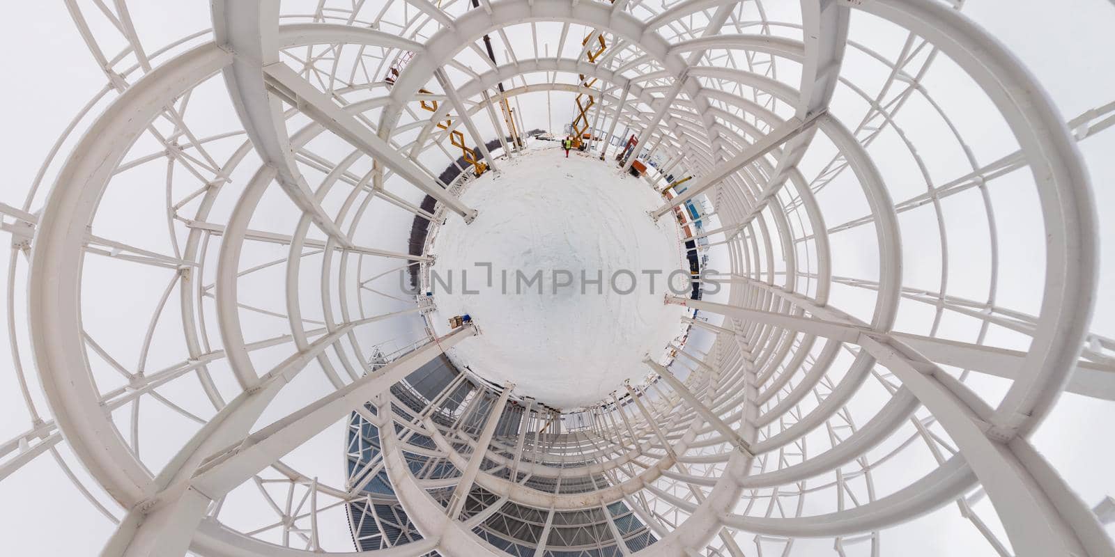 Full spherical 360 by 180 degree panorama of winter construction site in cloudy weather.Hyperbolic projection of sphere