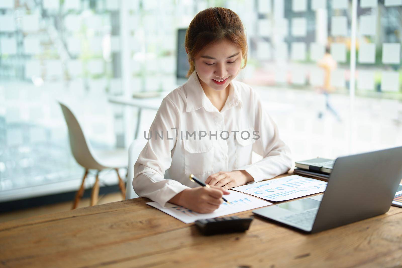 data analysis, plan, marketing, accounting, audit, Portrait of asian business woman planning marketing using statistical data sheet and computer to present marketing plan project at meeting