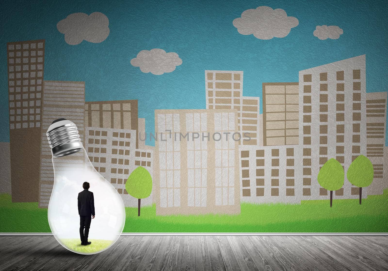 Businessman inside light bulb against city drawn concept