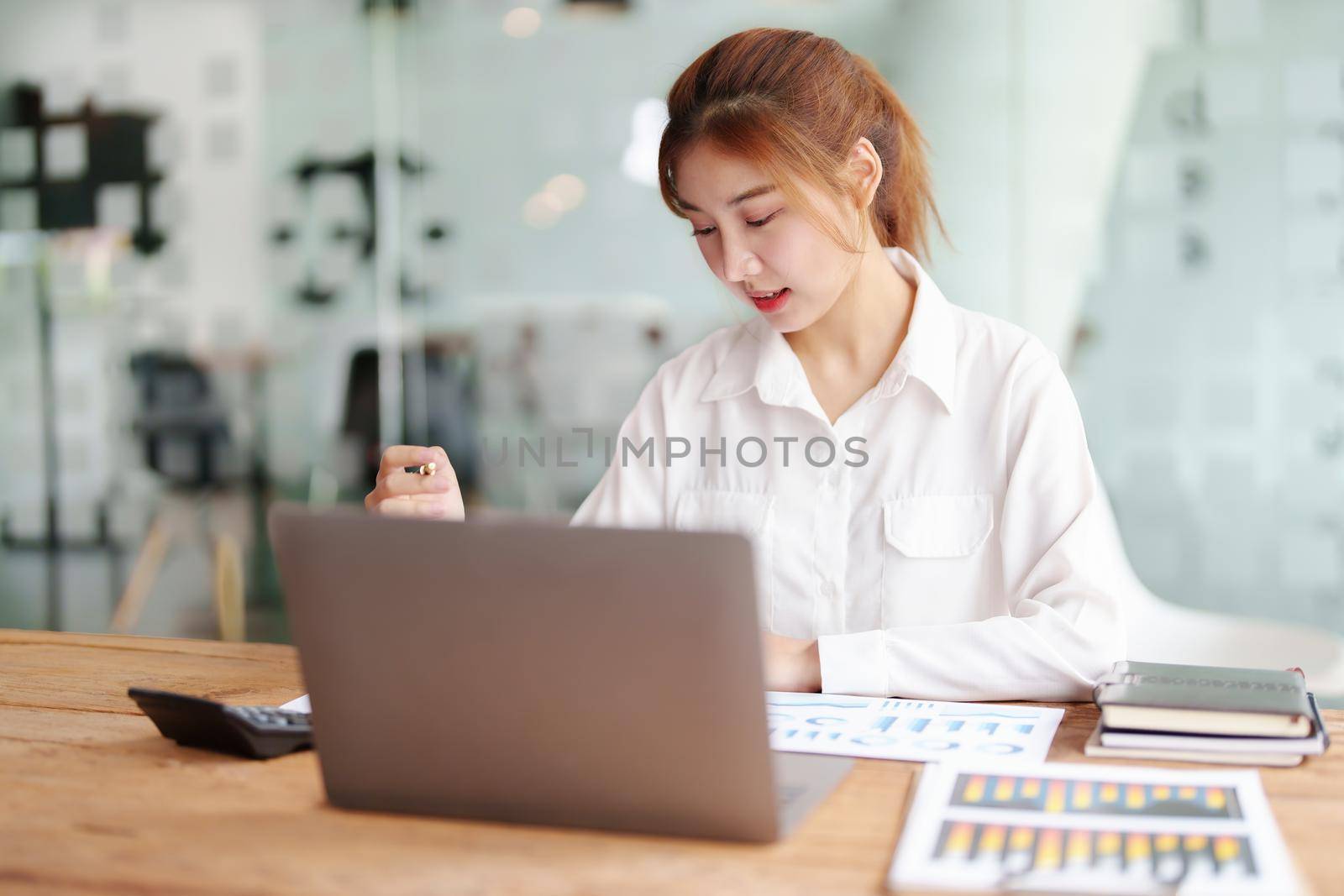 data analysis, plan, marketing, accounting, audit, Portrait of asian business woman planning marketing using statistical data sheet and computer to present marketing plan project at meeting