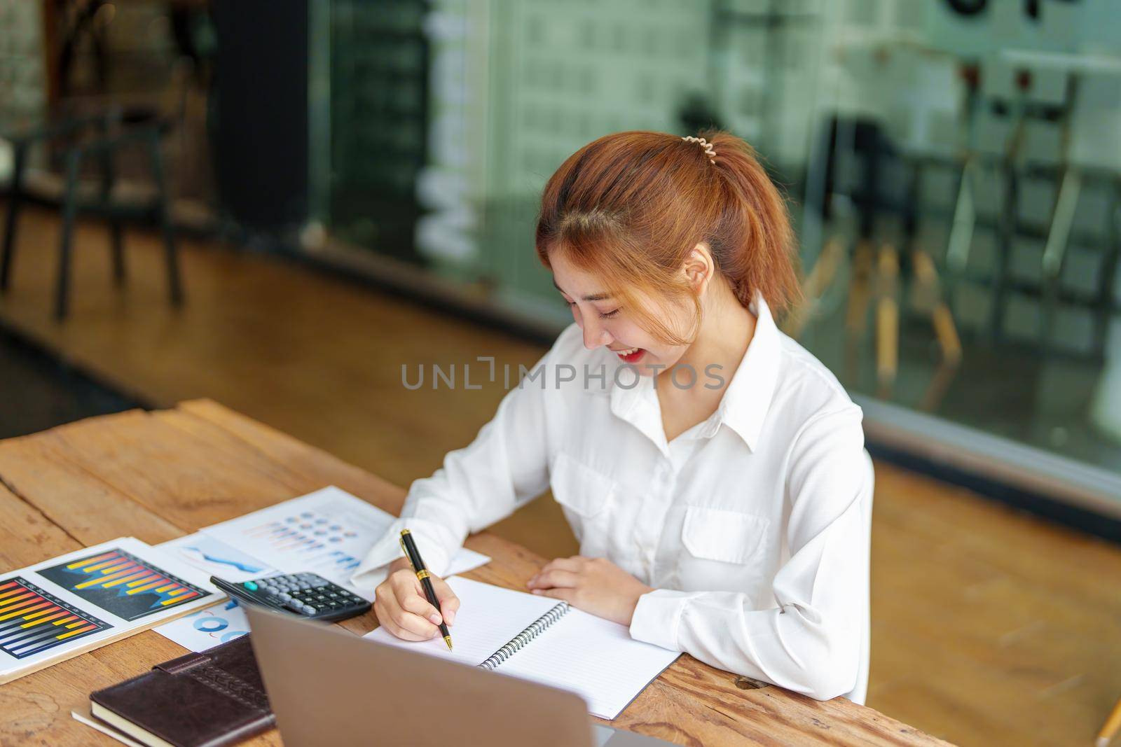 data analysis, plan, marketing, accounting, audit, Portrait of asian business woman working planning marketing using statistical data sheet and computer to present marketing plan project at meeting. by Manastrong