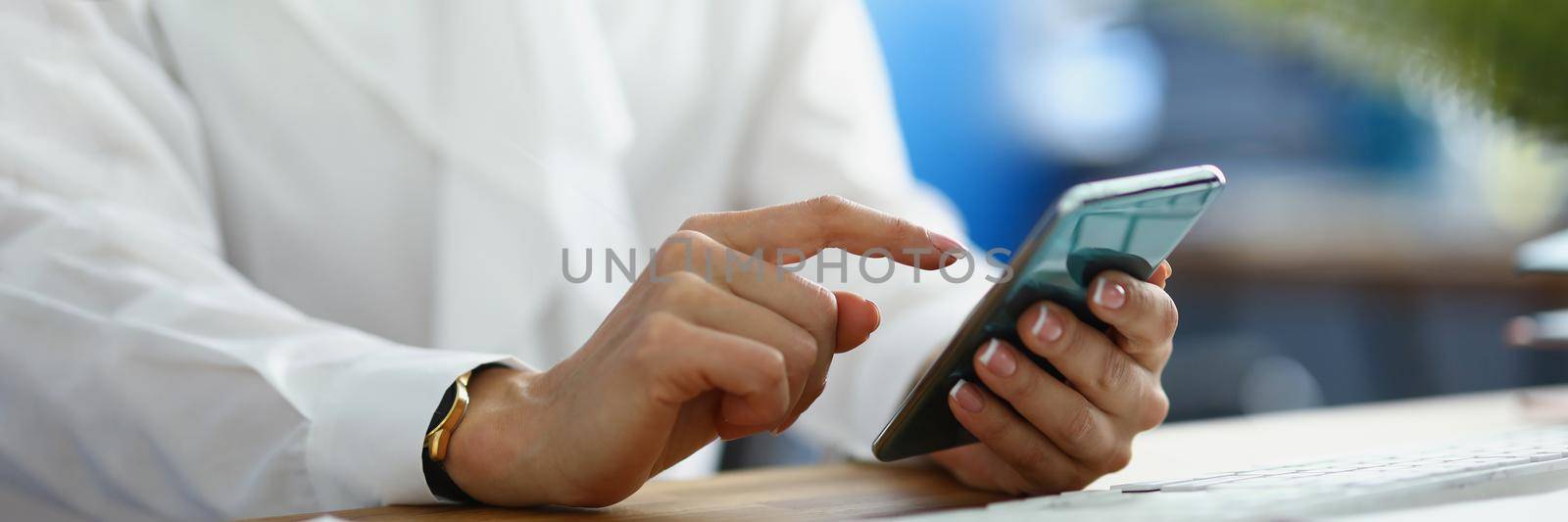 Close-up of businesswoman make important call for work, employee in suit in office. Typing message on mobile phone. Smartphone, business, job, communication concept