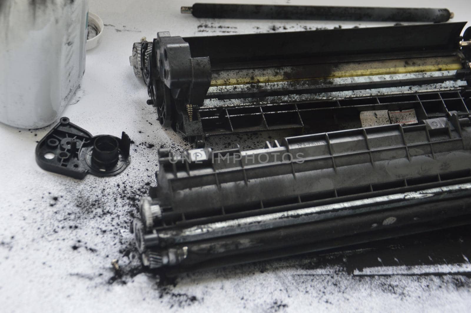 Charging the laser printer cartridge with toner powder by architectphd